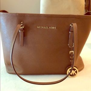 Light brown authentic Michael Kors purse